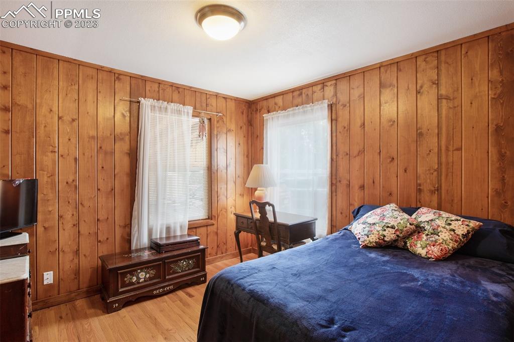 321 Dewell Road Woodland Park, CO 80863 - Photo 24 of 32 a bedroom with a bed and a window
