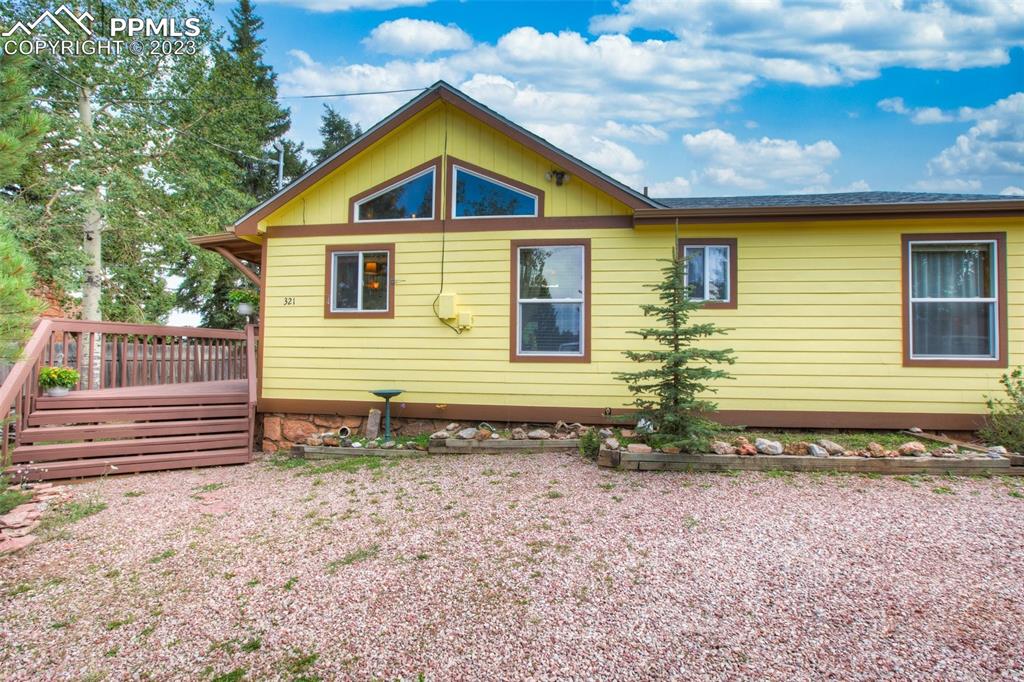 321 Dewell Road Woodland Park, CO 80863 - Photo 32 of 32 a front view of a house with a yard