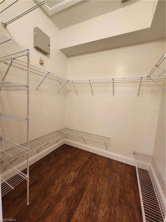 7512 Bristol Circle Naples, FL 34120 - Photo 11 of 22 a view of a room with racks on the wall