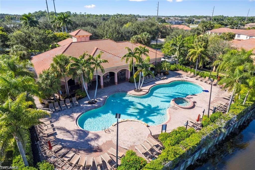 7512 Bristol Circle Naples, FL 34120 - Photo 19 of 22 an aerial view of a house with yard swimming pool and outdoor seating