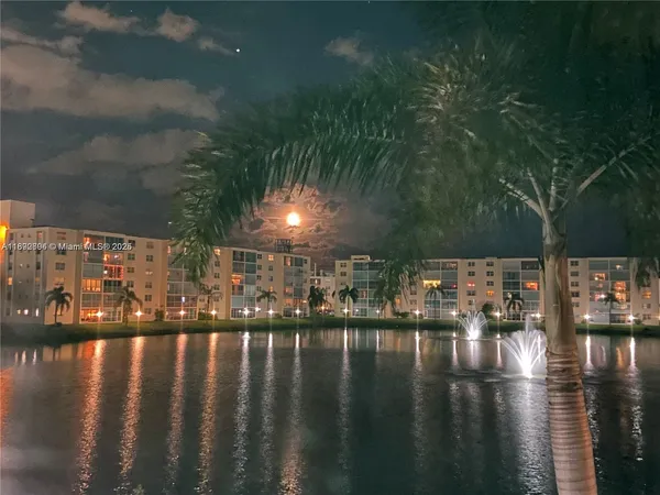 a view of a livingroom with furniture and window
