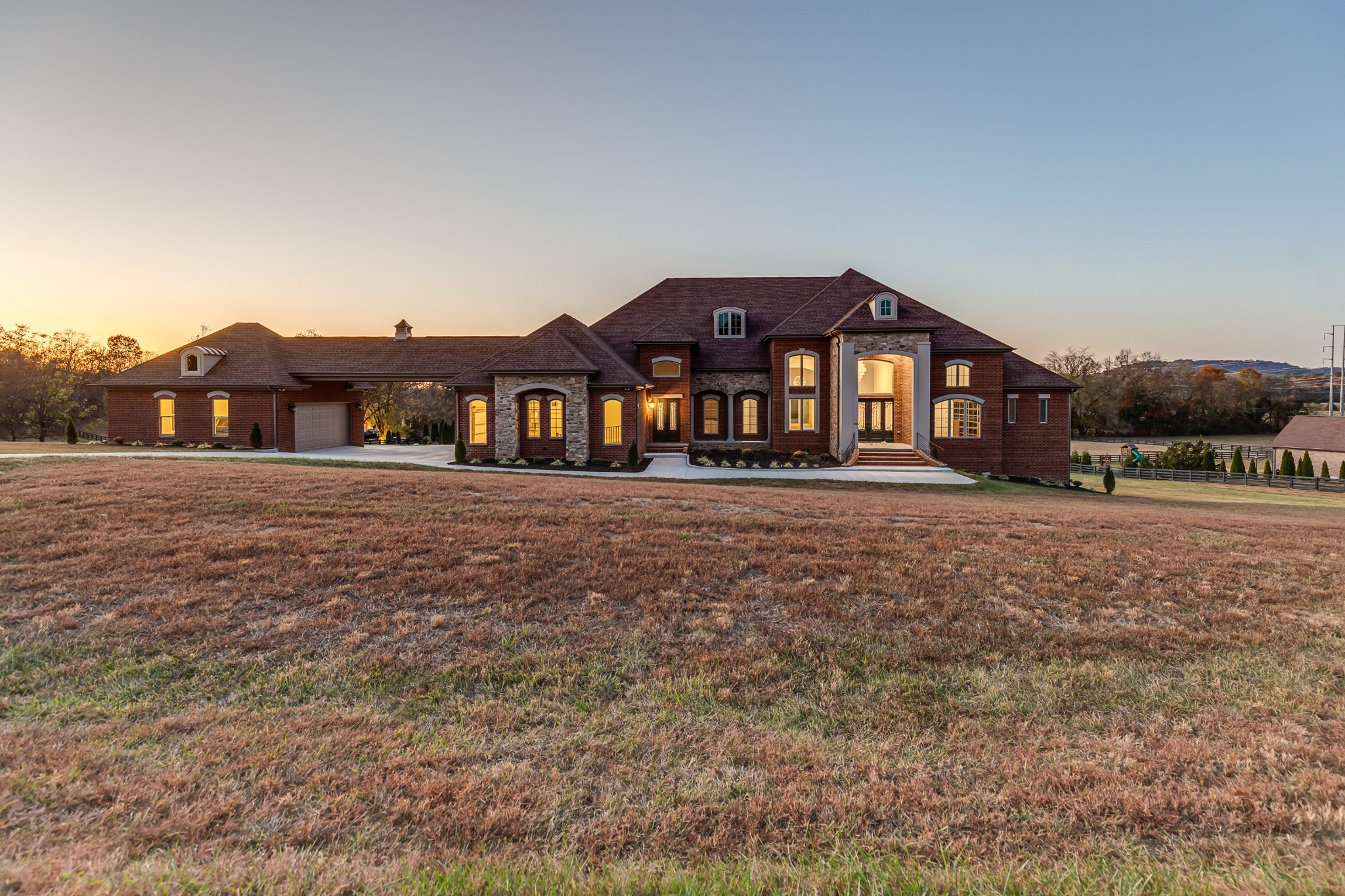 7100 Marsh Hawk Court Arrington, TN 37014 - Photo 1 of 59 a front view of a house with a yard