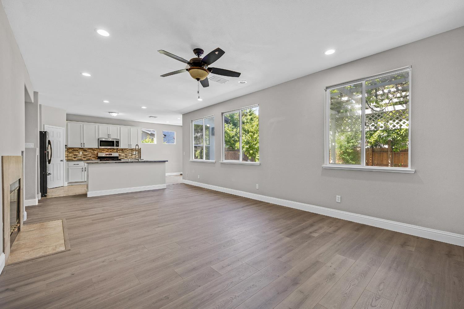 2963 Rugby Court Tracy, CA 95377 - Photo 14 of 40 a view of a living room a window and wooden floor