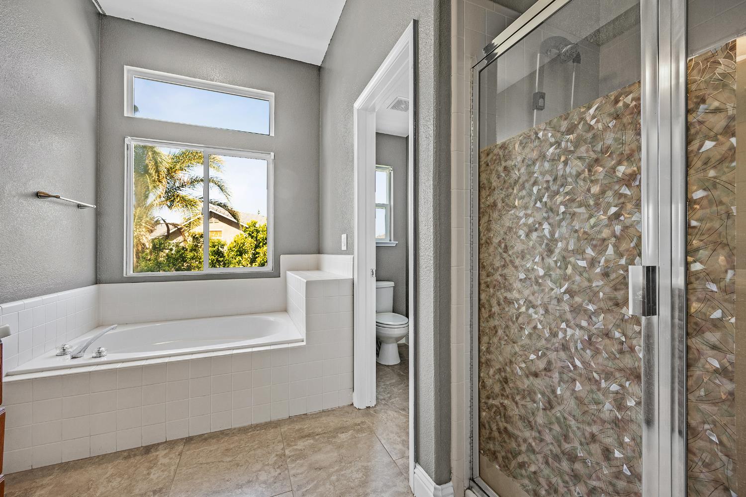 2963 Rugby Court Tracy, CA 95377 - Photo 25 of 40 a bathroom with a bathtub and shower