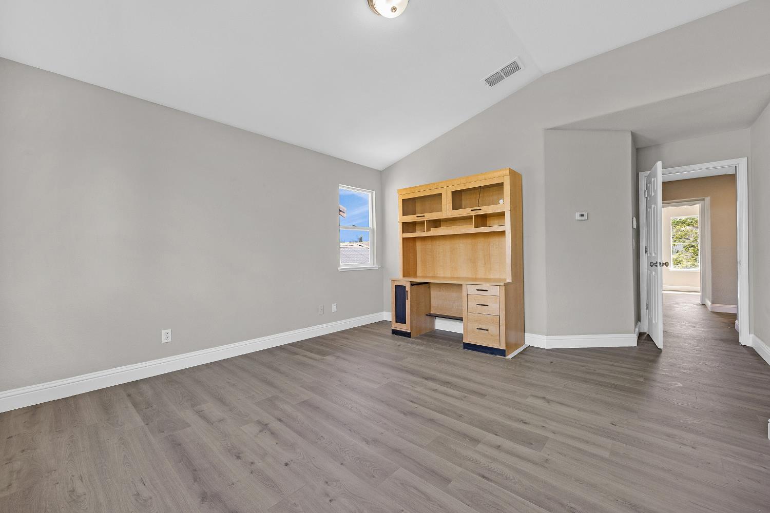 2963 Rugby Court Tracy, CA 95377 - Photo 28 of 40 an empty room with wooden floor closet and windows