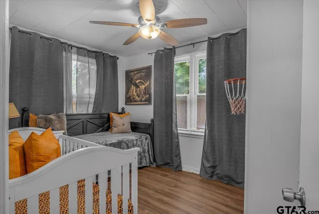 a view of a livingroom with furniture and window