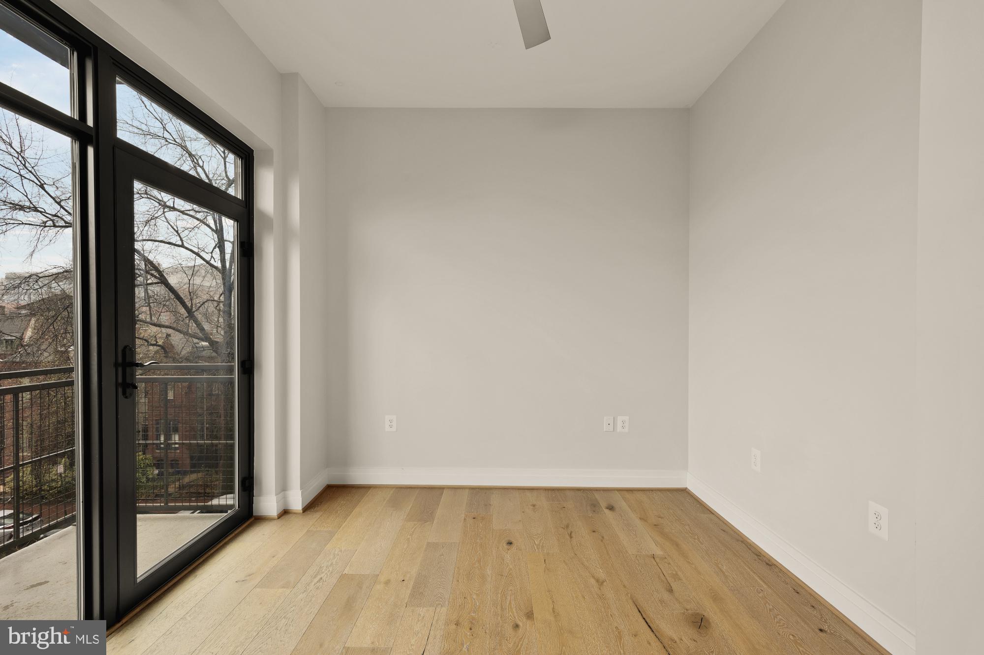 301 H Street Northeast, Unit 305 Washington, DC 20002 - Photo 15 of 25 a view of an empty room and window