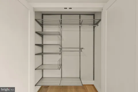 a view of a room with racks on the wall