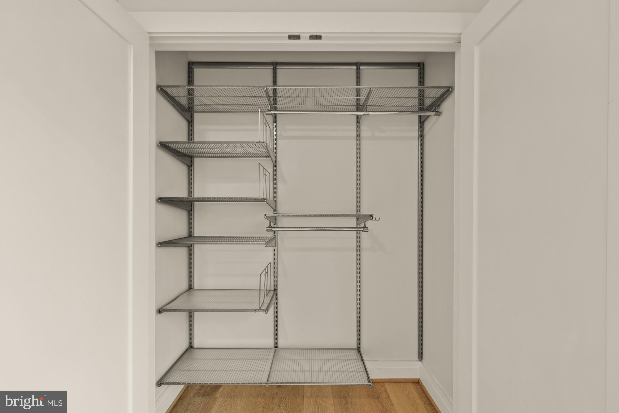 301 H Street Northeast, Unit 305 Washington, DC 20002 - Photo 17 of 25 a view of a room with racks on the wall