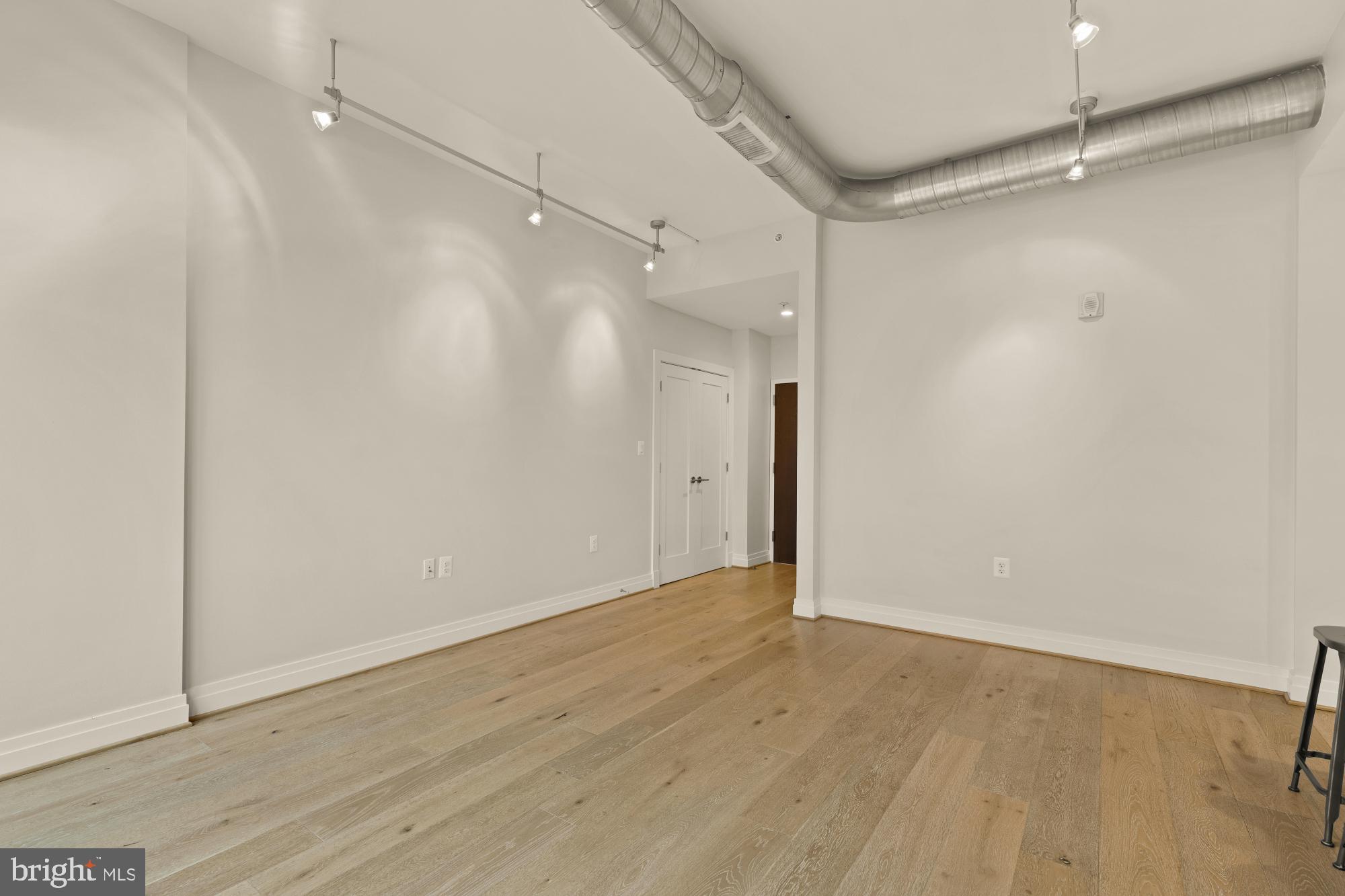 301 H Street Northeast, Unit 305 Washington, DC 20002 - Photo 7 of 25 a view of an empty room