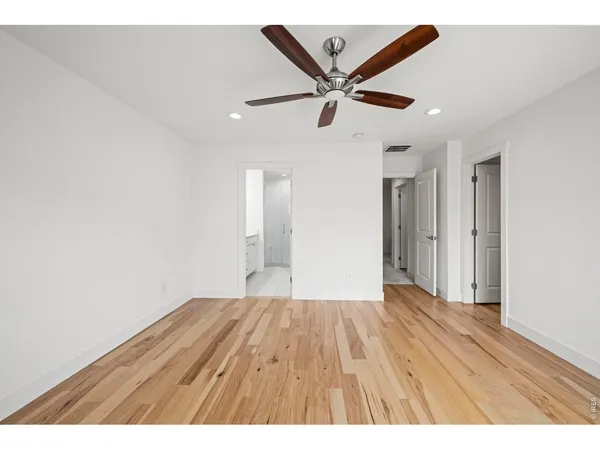 a bathroom with a shower sink double and mirror