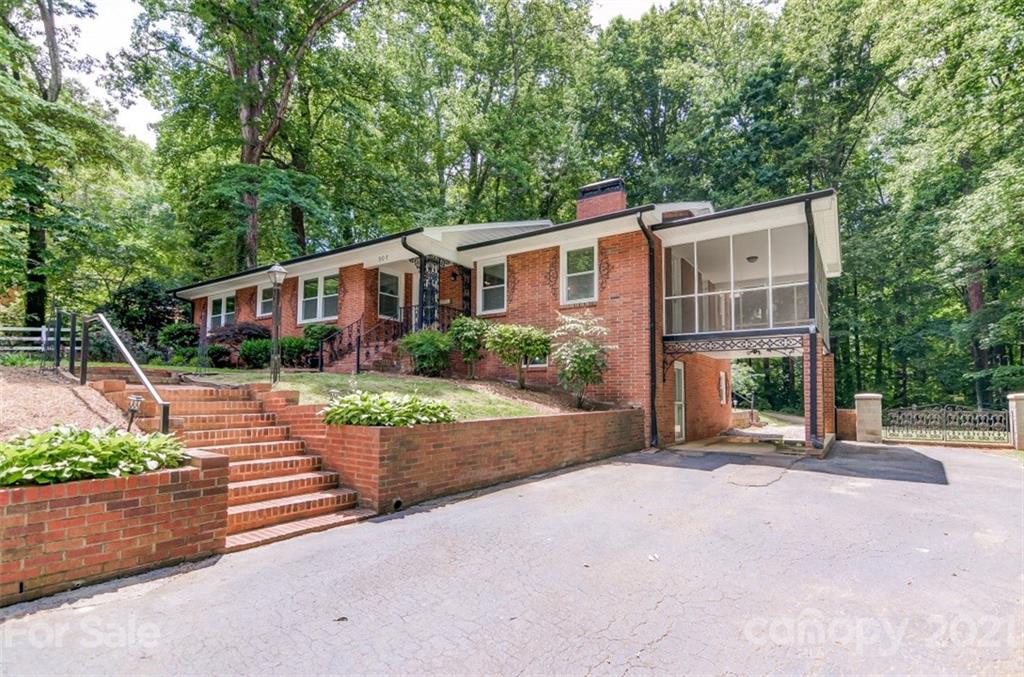 501 Dunham Road Gastonia, NC 28054 - Photo 2 of 38 a front view of a house with a yard and potted plants