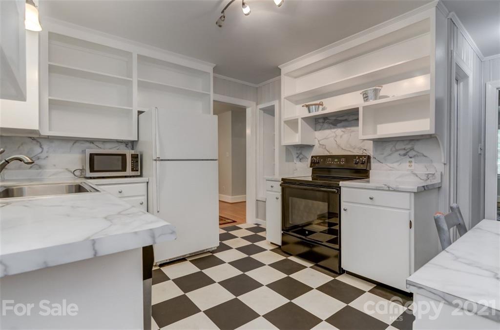 501 Dunham Road Gastonia, NC 28054 - Photo 12 of 38 a kitchen with a refrigerator and a stove