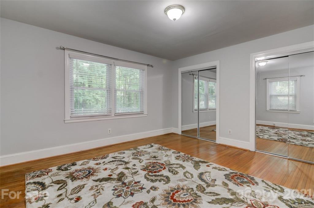 501 Dunham Road Gastonia, NC 28054 - Photo 13 of 38 a view of empty room with window and wooden floor