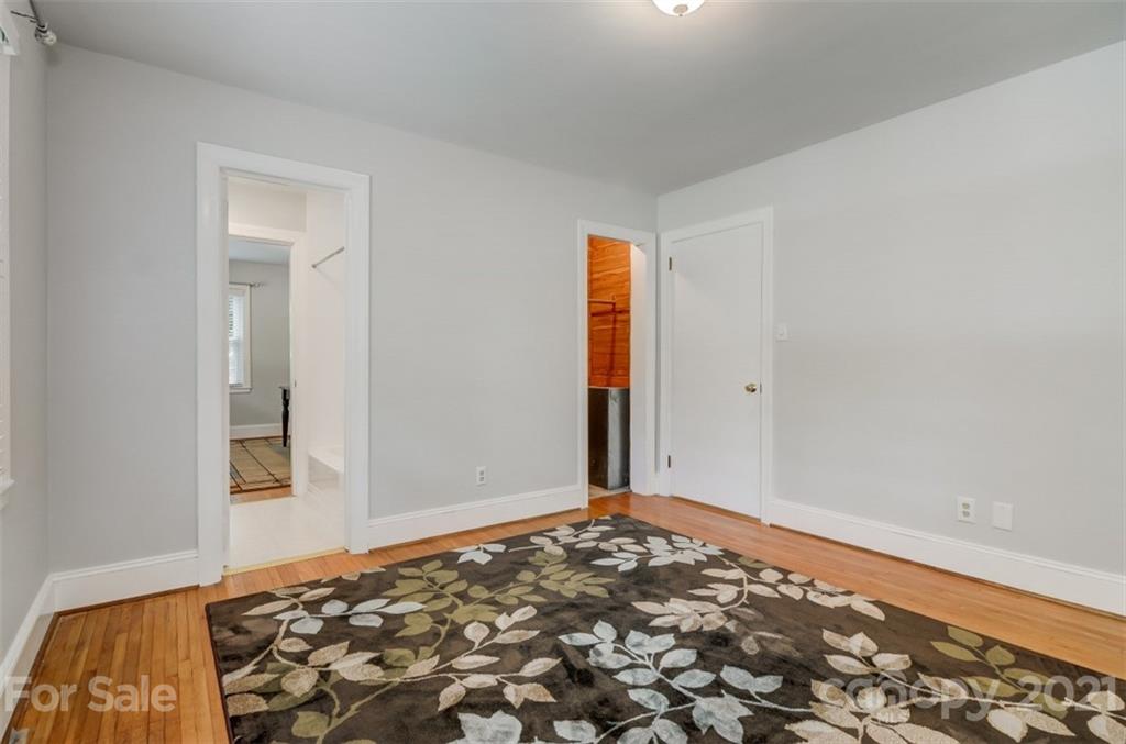 501 Dunham Road Gastonia, NC 28054 - Photo 16 of 38 a view of a room with a bed and wooden floor