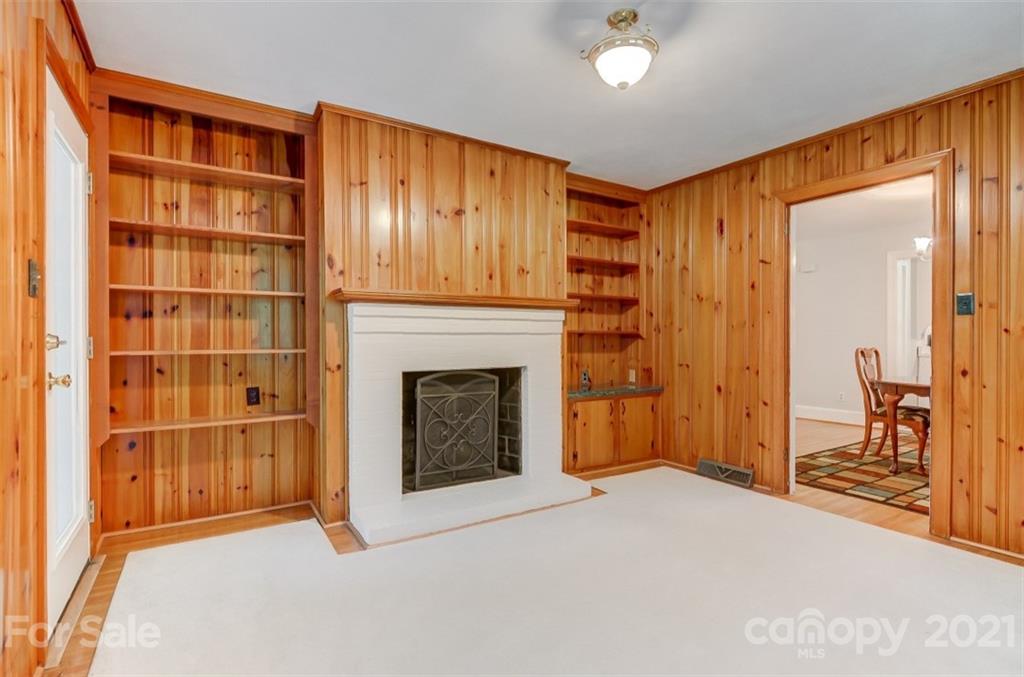 501 Dunham Road Gastonia, NC 28054 - Photo 24 of 38 a view of an empty room with a fireplace and a window