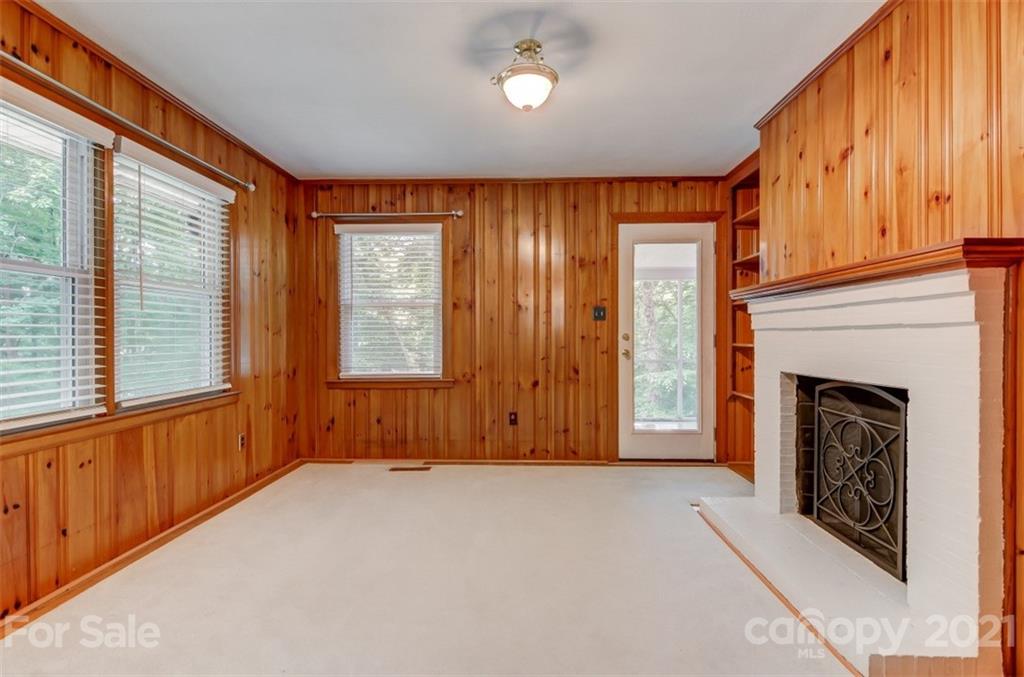 501 Dunham Road Gastonia, NC 28054 - Photo 25 of 38 a view of an empty room with a fireplace and a window