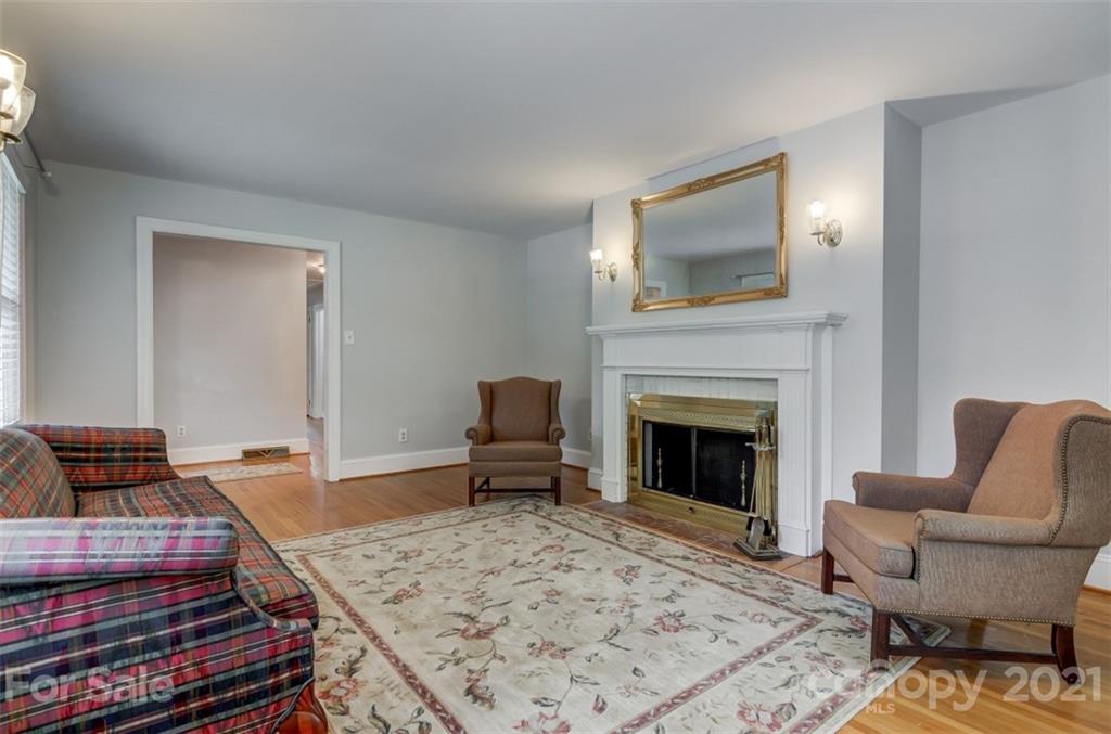 501 Dunham Road Gastonia, NC 28054 - Photo 6 of 38 a living room with furniture and a fireplace