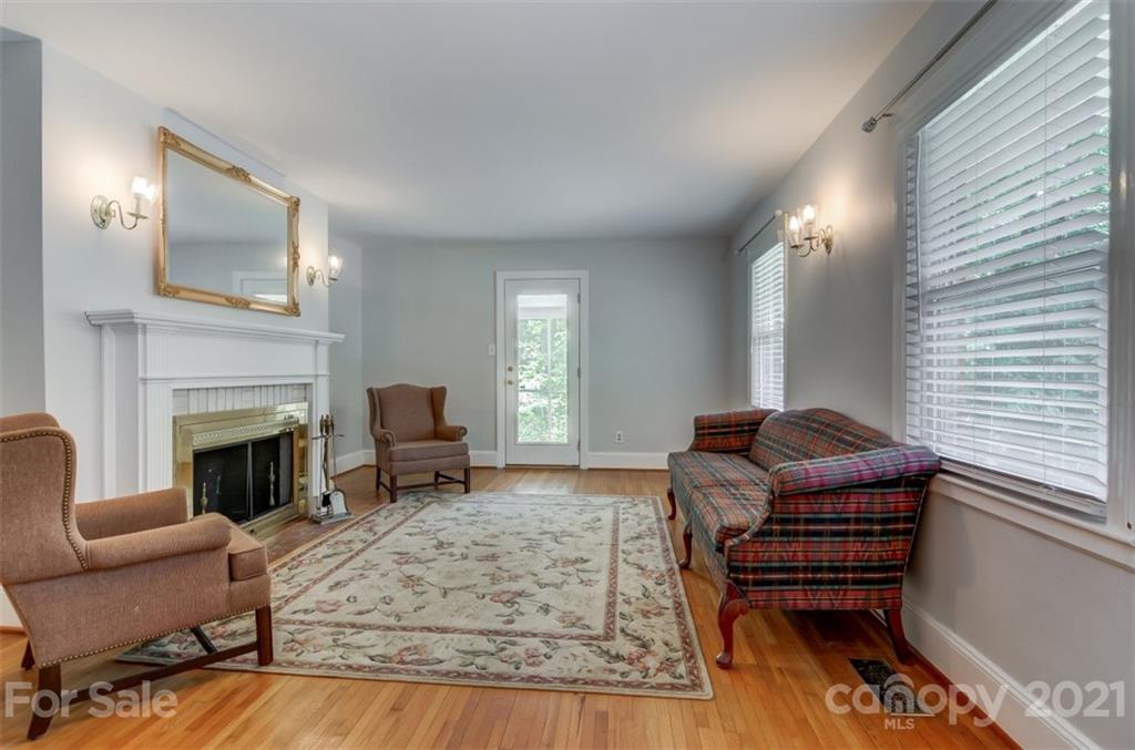 501 Dunham Road Gastonia, NC 28054 - Photo 7 of 38 a living room with furniture or fireplace and a wooden floor