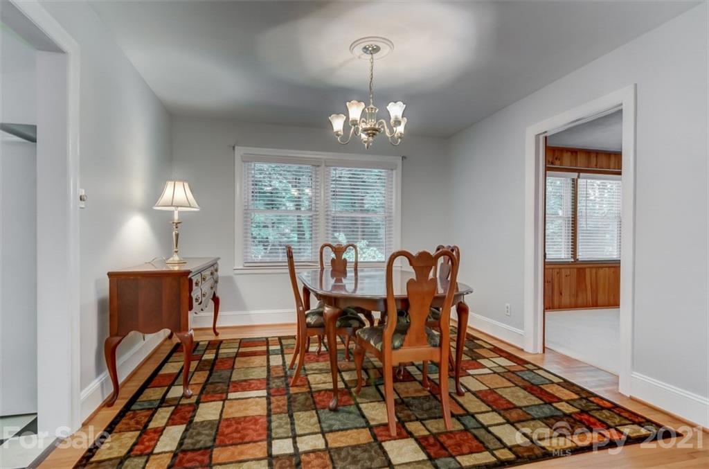 501 Dunham Road Gastonia, NC 28054 - Photo 9 of 38 a view of a dining room with furniture and chandelier