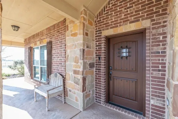 a view of front door of house with outdoor space