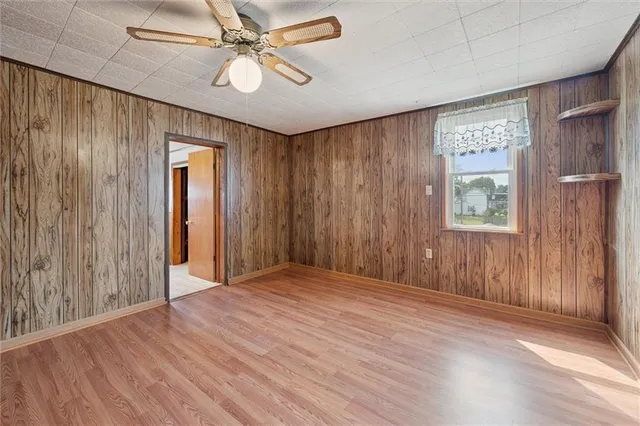 a view of bedroom with a bed and furniture