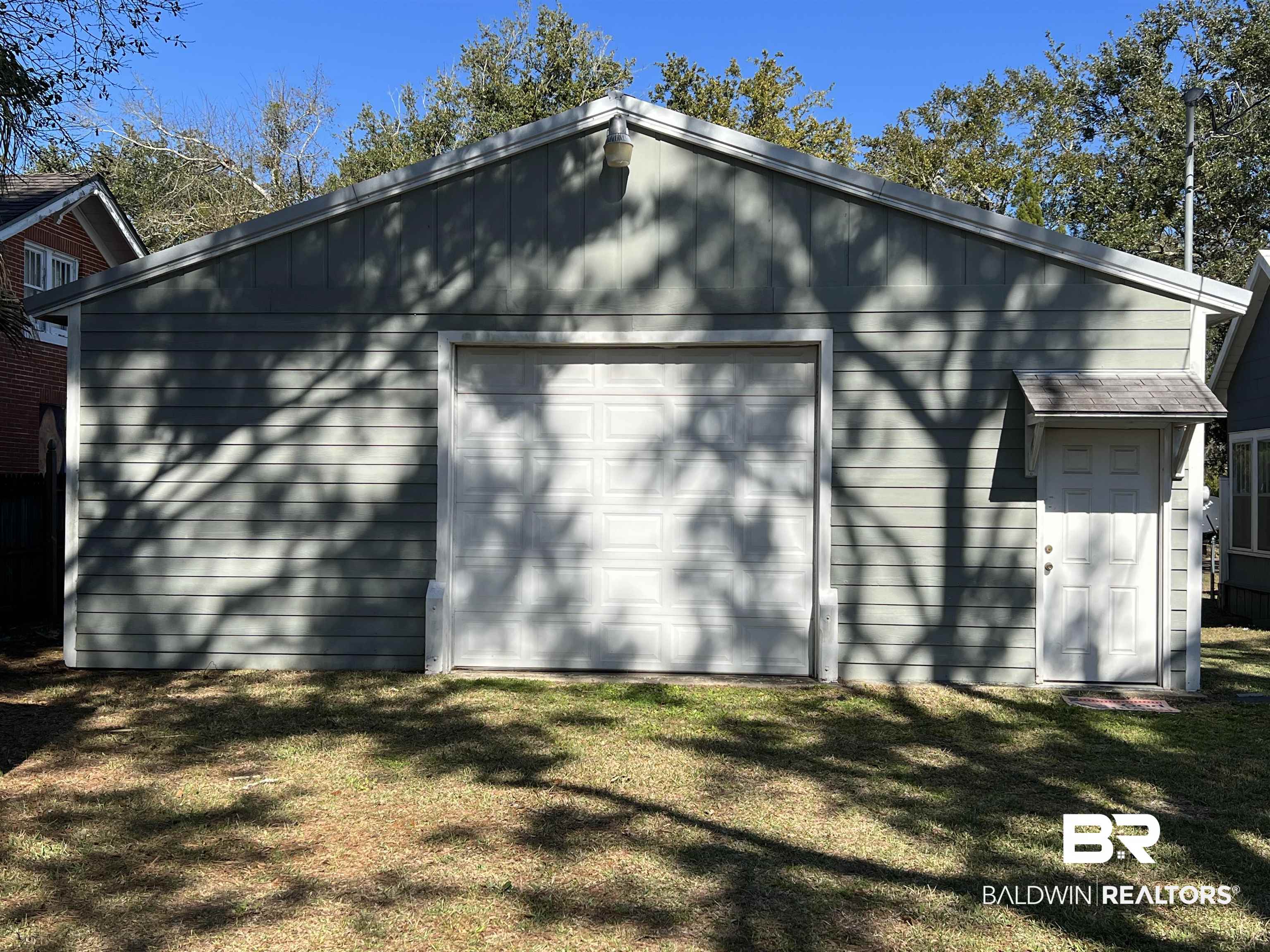 213 West Rose Avenue Foley, AL 36535 - Photo 4 of 15 Door of garage at rear