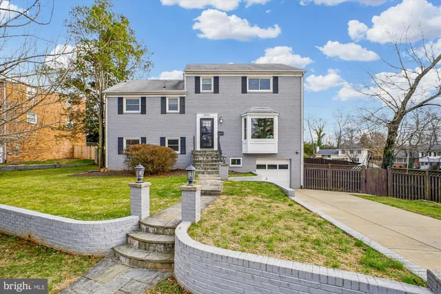 a view of swimming pool with a patio