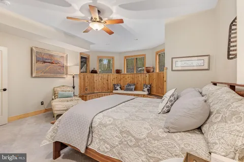 a bathroom with a toilet sink and shower