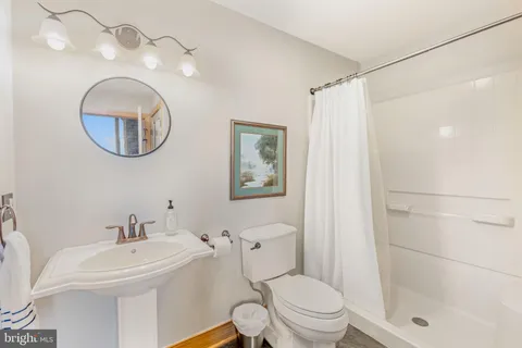 a view of a backyard with sitting area