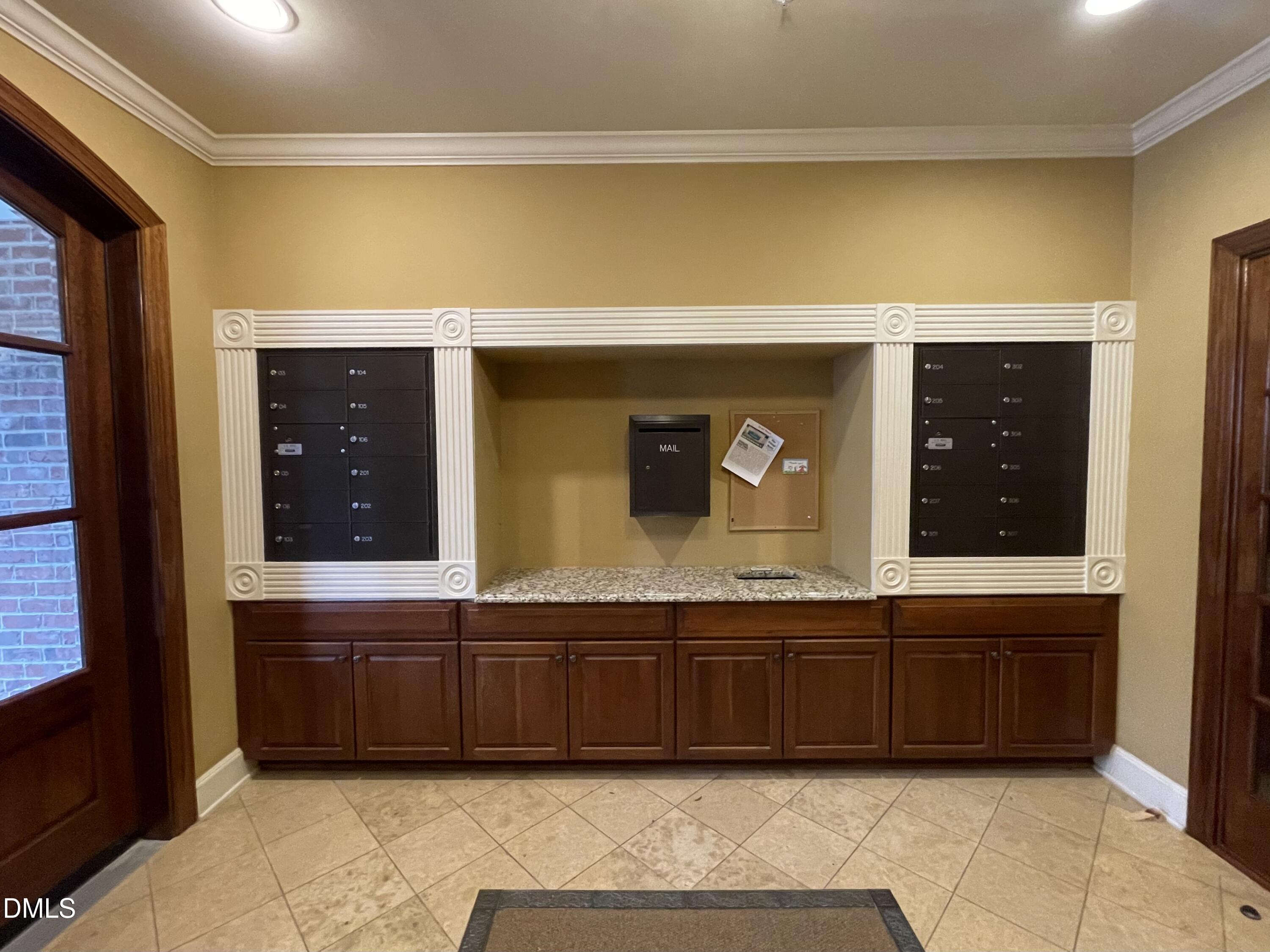 10411 Rosegate Court, Unit 3 Raleigh, NC 27617 - Photo 58 of 62 a bathroom with a sink and mirror