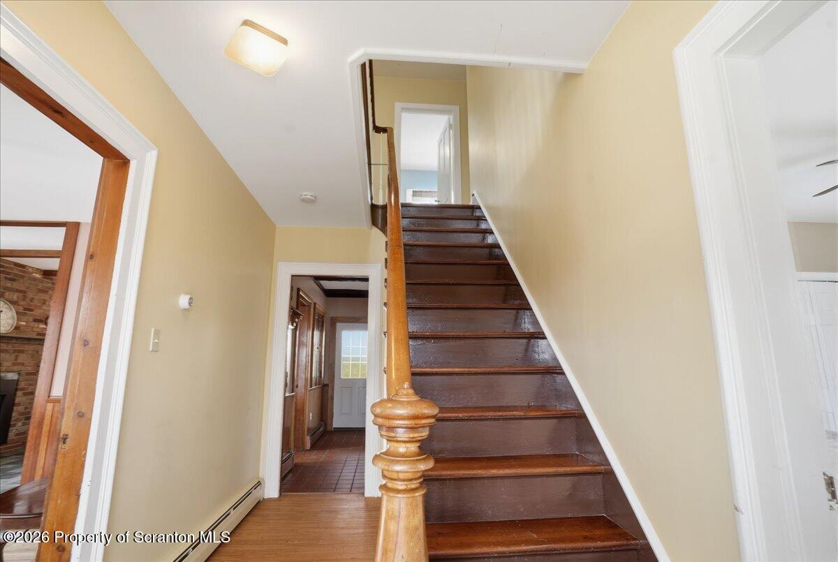 795 Wescott Road New Milford, PA 18834 - Photo 20 of 81 a view of entryway and hall with wooden floor