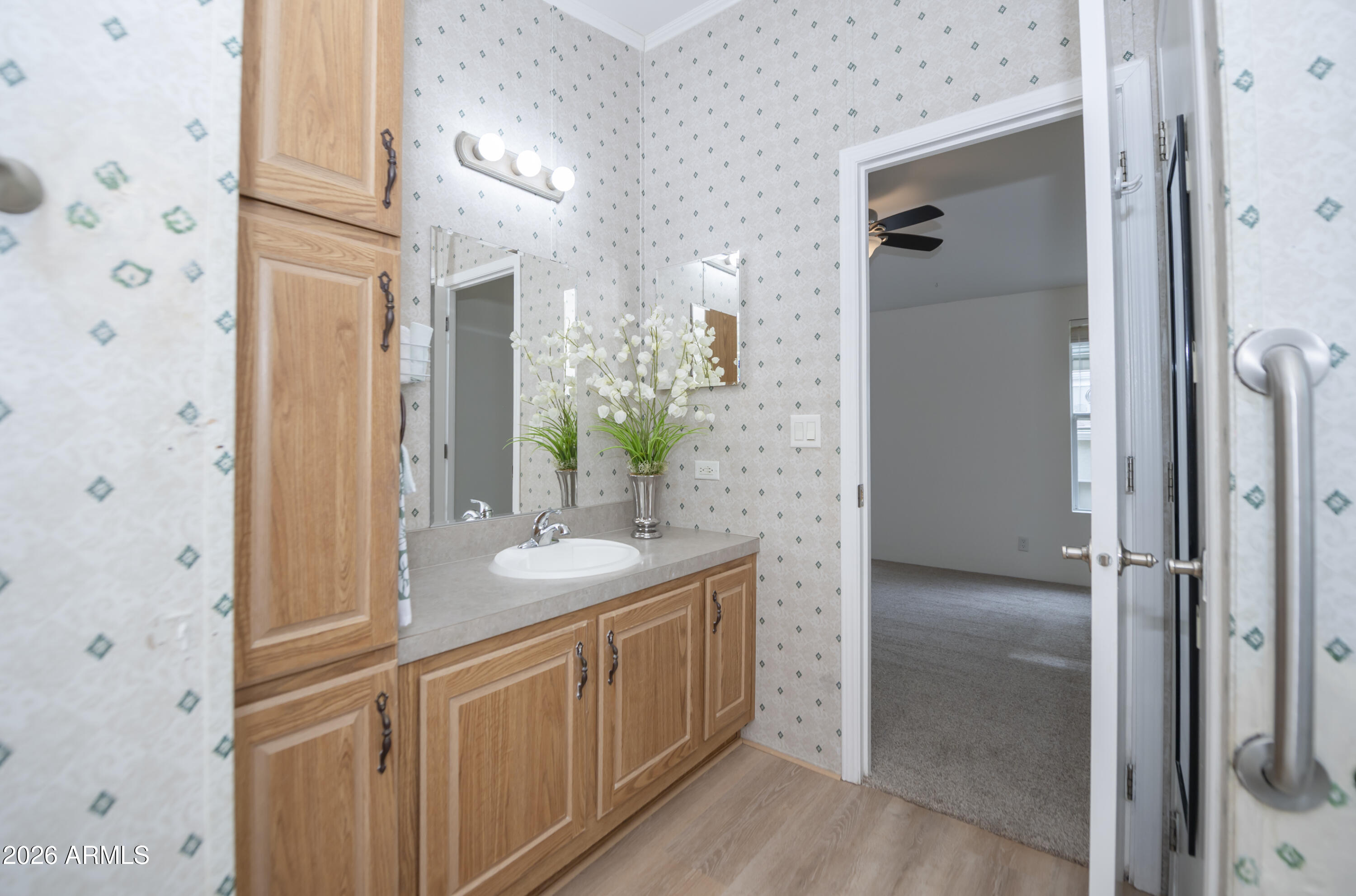 11250 East State Rte 69, Unit 1125 Dewey, AZ 86327 - Photo 23 of 45 a bathroom with a double vanity sink and mirror