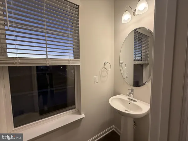 a bathroom with a toilet and a sink