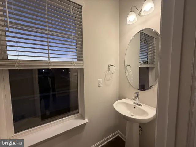 a bathroom with a toilet and a sink