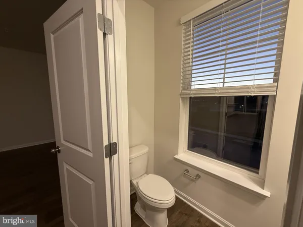 a view of a balcony with furniture