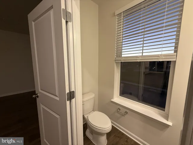 a view of a balcony with furniture