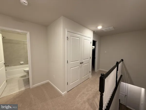 a bathroom with a shower and toilet