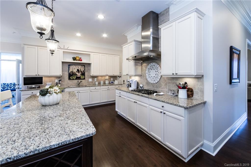 16905 Red Cow Road Charlotte, NC 28277 - Photo 12 of 47 a kitchen with sink stove and cabinets