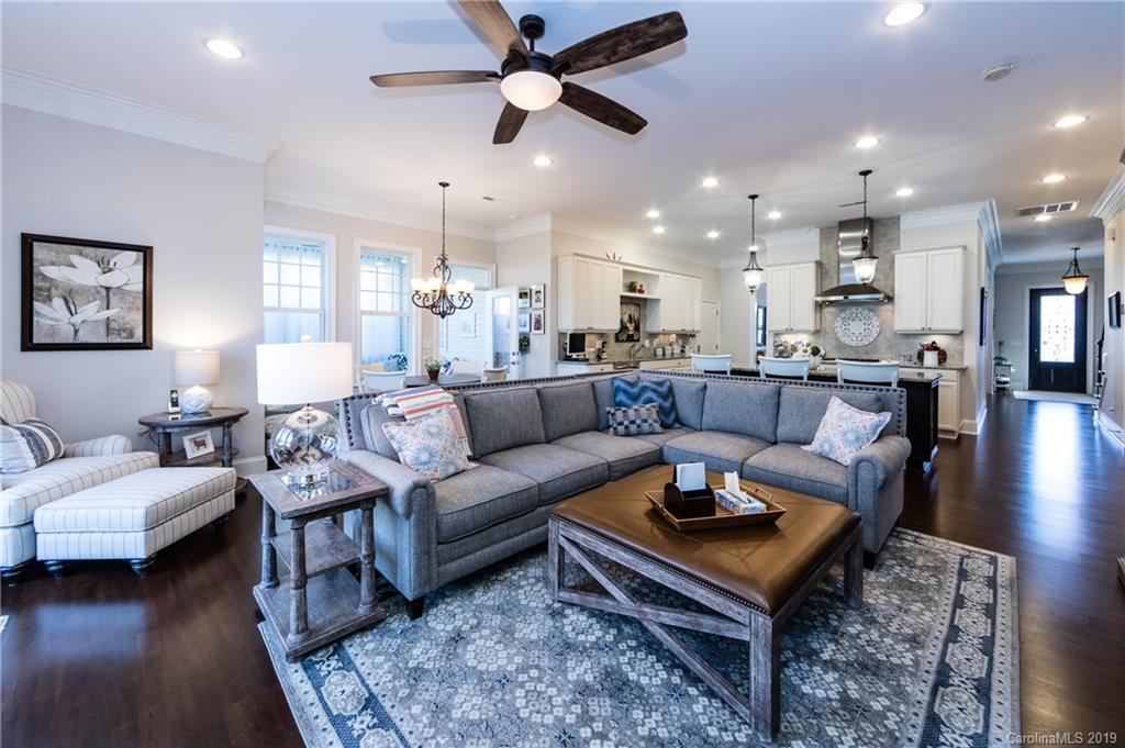 16905 Red Cow Road Charlotte, NC 28277 - Photo 16 of 47 a living room with furniture a ceiling fan and a rug