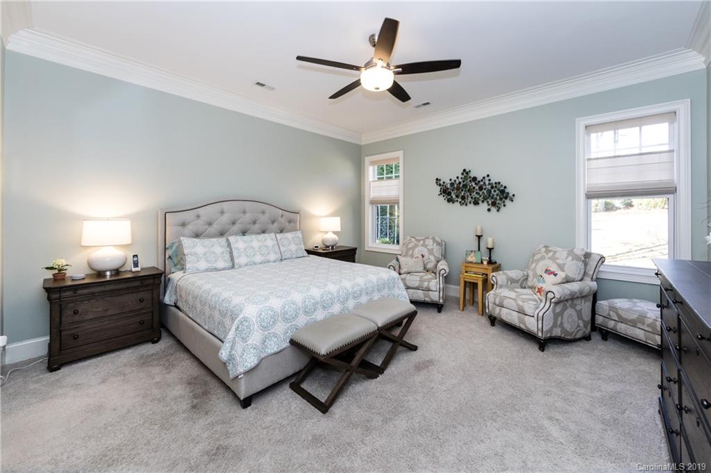 16905 Red Cow Road Charlotte, NC 28277 - Photo 21 of 47 a spacious bedroom with a bed and window