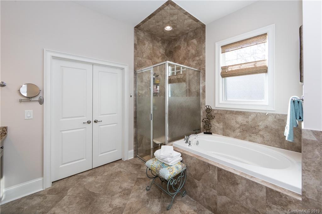 16905 Red Cow Road Charlotte, NC 28277 - Photo 25 of 47 a bathroom with a tub toilet and a sink