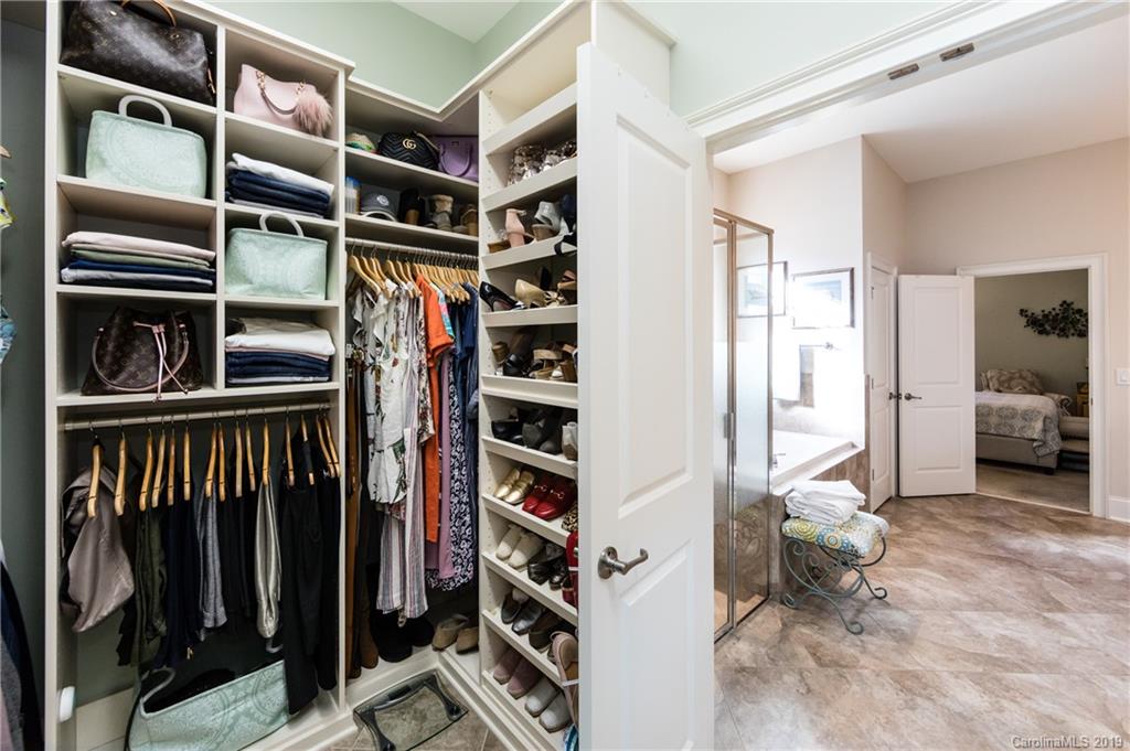 16905 Red Cow Road Charlotte, NC 28277 - Photo 28 of 47 a view of walk in closet with clothes and shoes