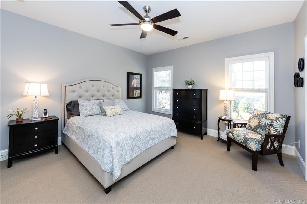 16905 Red Cow Road Charlotte, NC 28277 - Photo 30 of 47 a bedroom with a bed and a couch