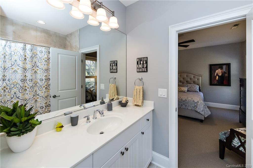 16905 Red Cow Road Charlotte, NC 28277 - Photo 32 of 47 a en suite bathroom with double vanity and a mirror