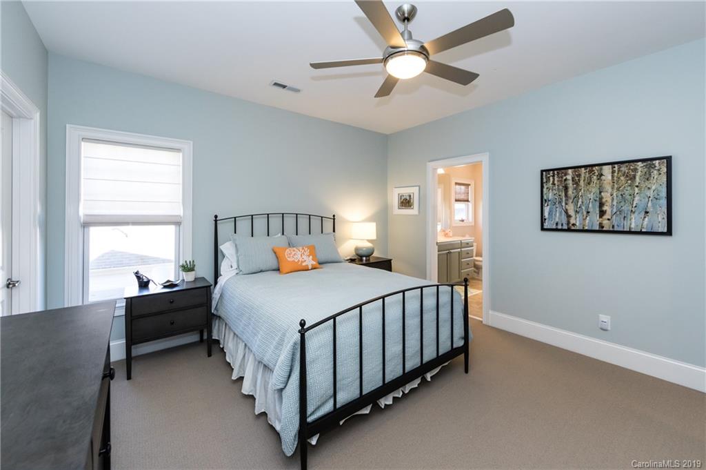 16905 Red Cow Road Charlotte, NC 28277 - Photo 33 of 47 a bed sitting in a bedroom next to a window