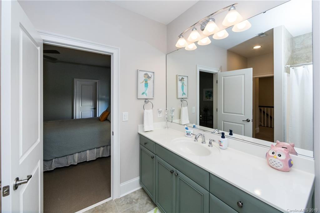 16905 Red Cow Road Charlotte, NC 28277 - Photo 34 of 47 a en suite bathroom with a sink double vanity and a mirror