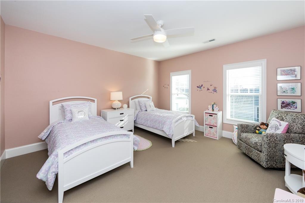 16905 Red Cow Road Charlotte, NC 28277 - Photo 36 of 47 a spacious bedroom with two beds and large windows