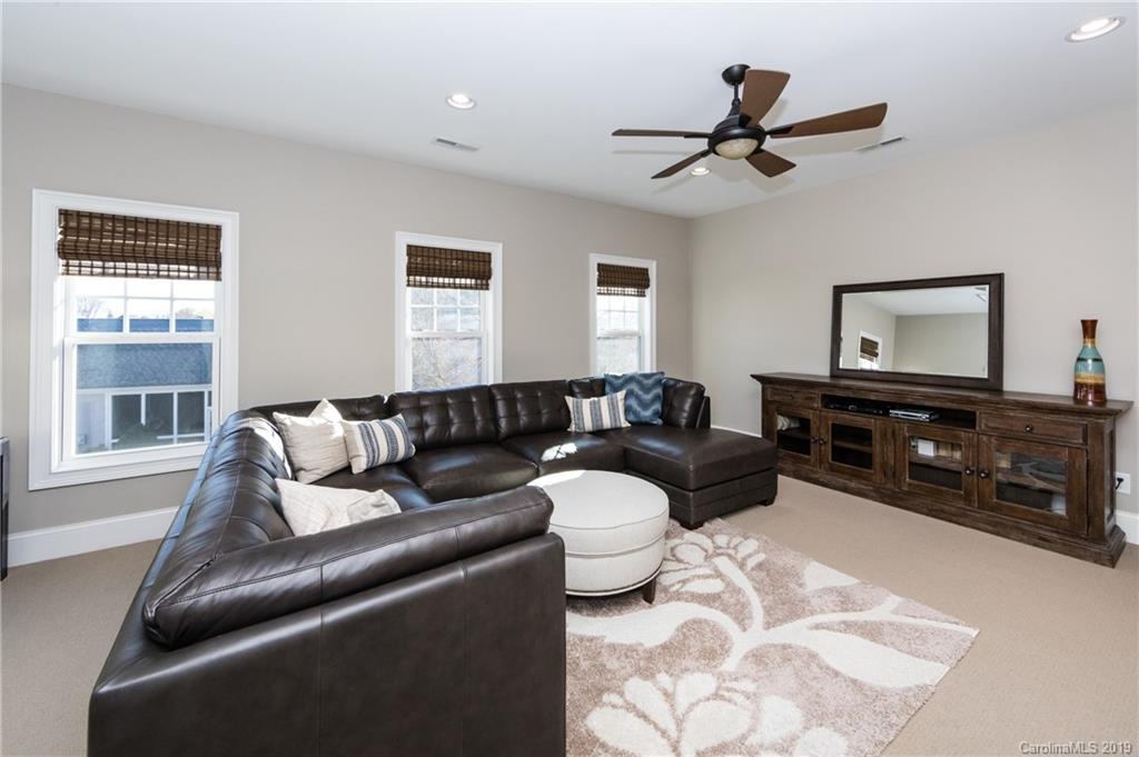 16905 Red Cow Road Charlotte, NC 28277 - Photo 37 of 47 a living room with furniture and a flat screen tv