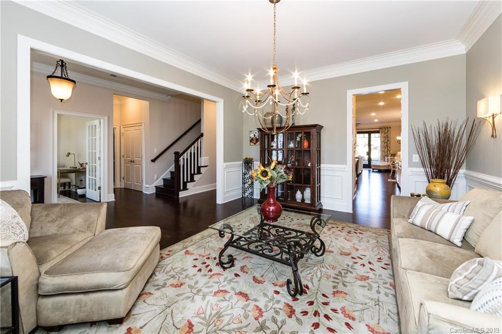 16905 Red Cow Road Charlotte, NC 28277 - Photo 8 of 47 a living room with furniture and a chandelier